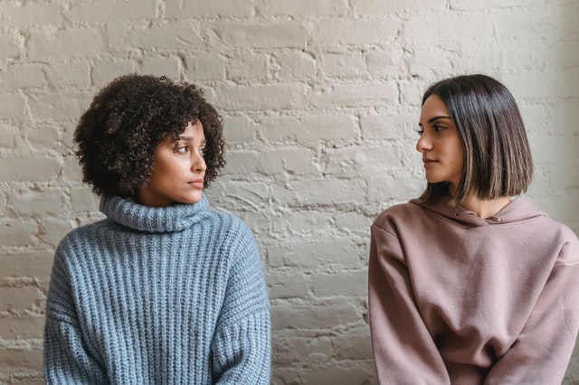 Female couple looking at each other