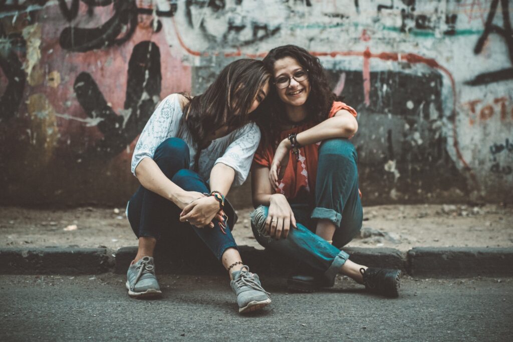 Two women laughing together